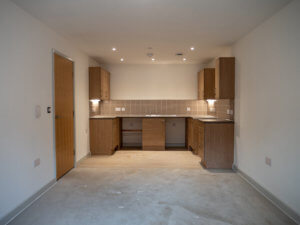 A kitchen inside the apartments at Edelweiss Hotel, Colwyn Bay